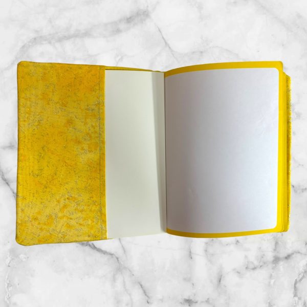 Dragon Fyre notebook cover featuring a majestic blue dragon with shimmering scales on a yellow background and a yellow elastic band.