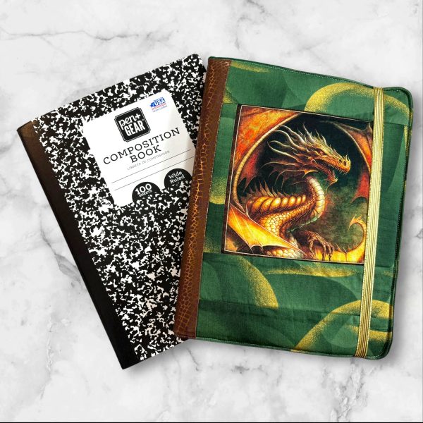 Dan Morris Dragon Fyre composition notebook cover featuring a golden dragon on a forest-green background with brown accents.