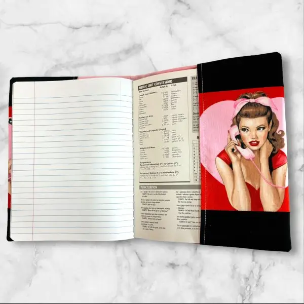 Glamorous Retro Pin-Up Girl Composition Notebook Cover with a smiling pin-up girl in a pink satin top framed by a heart-shaped red background.