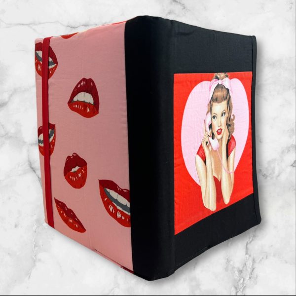 Classic Pin-Up Girl Composition Notebook Cover featuring a retro design with a stylish pin-up girl framed in a heart-shaped red background.